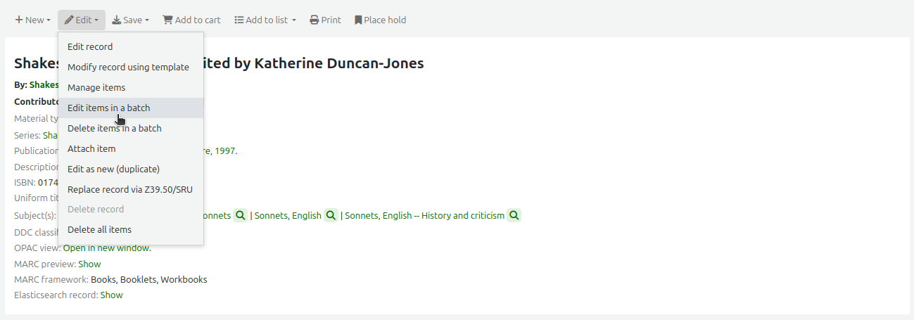 The Edit menu in a bibliographic record, the mouse cursor is on the 'Edit items in a batch' option