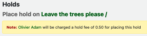 On the Place hold page, "Note: Olivier Adam will be charged a hold fee of 0.50 for placing this hold"