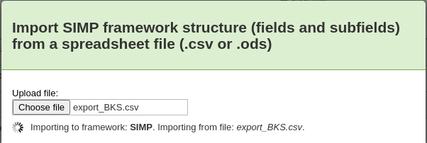 Pop-up to choose the file to import into a MARC framework, underneath is a spinning icon with the text Importing to framework