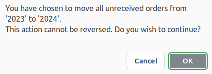 Warning message reading "You have chosen to move all unreceived orders from '2023' to '2024'. This action cannot be reversed. Do you wish to continue?"